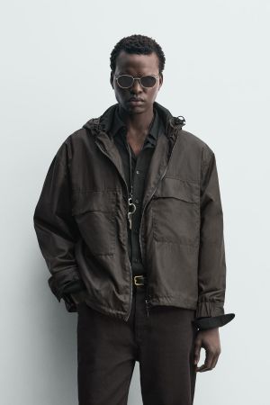 HOODED TECHNICAL JACKET