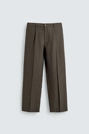 FLOWY TEXTURED PLEATED PANTS