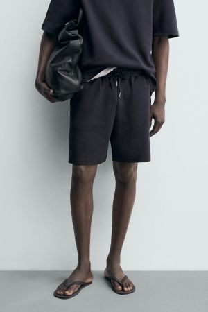 RELAXED FIT INTERLOCK JOGGER SHORTS