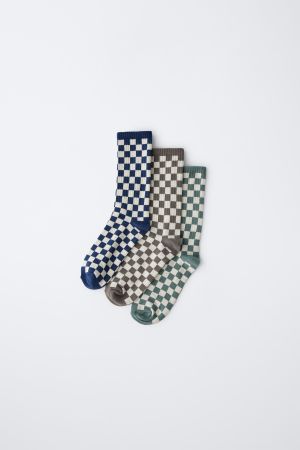 THREE-PACK OF CHECKERED MID-CALF SOCKS