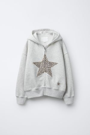 ZIP-UP ANIMAL PRINT STAR SWEATSHIRT