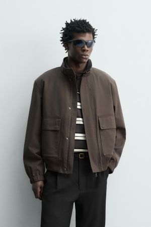 TECHNICAL JACKET WITH REMOVABLE VEST