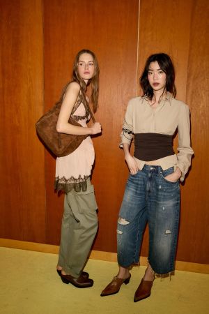 MID-RISE RIPPED DENIM JORTS