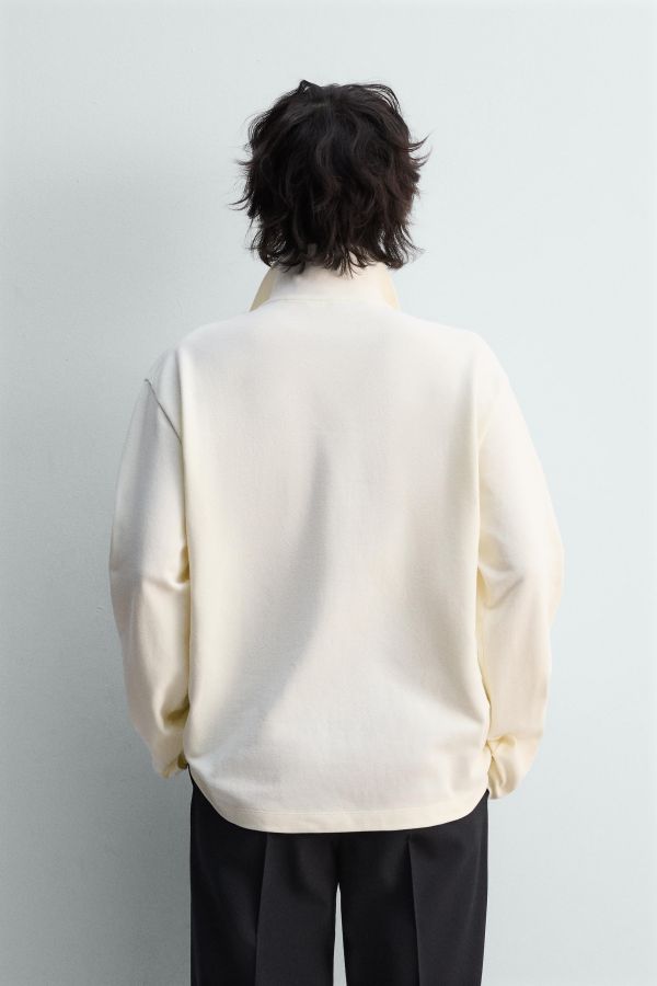 REGULAR FIT TEXTURED PIQUÉ POLO