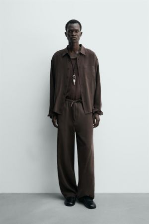 RELAXED FIT FLOWY PANTS