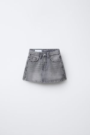 STUDDED DENIM SKORT