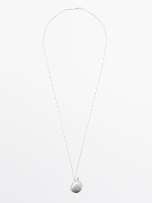 Necklace with metal pendant