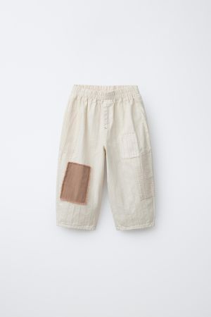 BAGGY RUSTIC PATCH PANTS