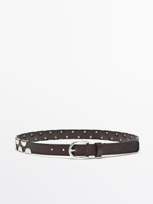 Belt with metal appliqués