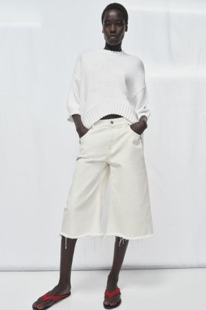 ASYMMETRIC HEM SHORT SLEEVE KNIT JUMPER