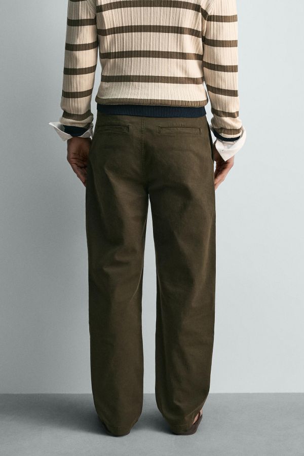 PLEATED CHINO PANTS