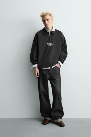 EMBROIDERED ZIP POLO SHIRT